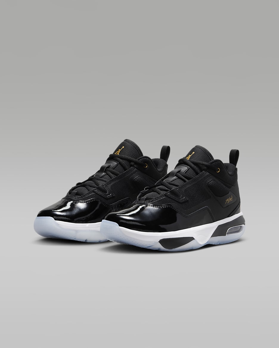 Black jordans with gold logo outlet